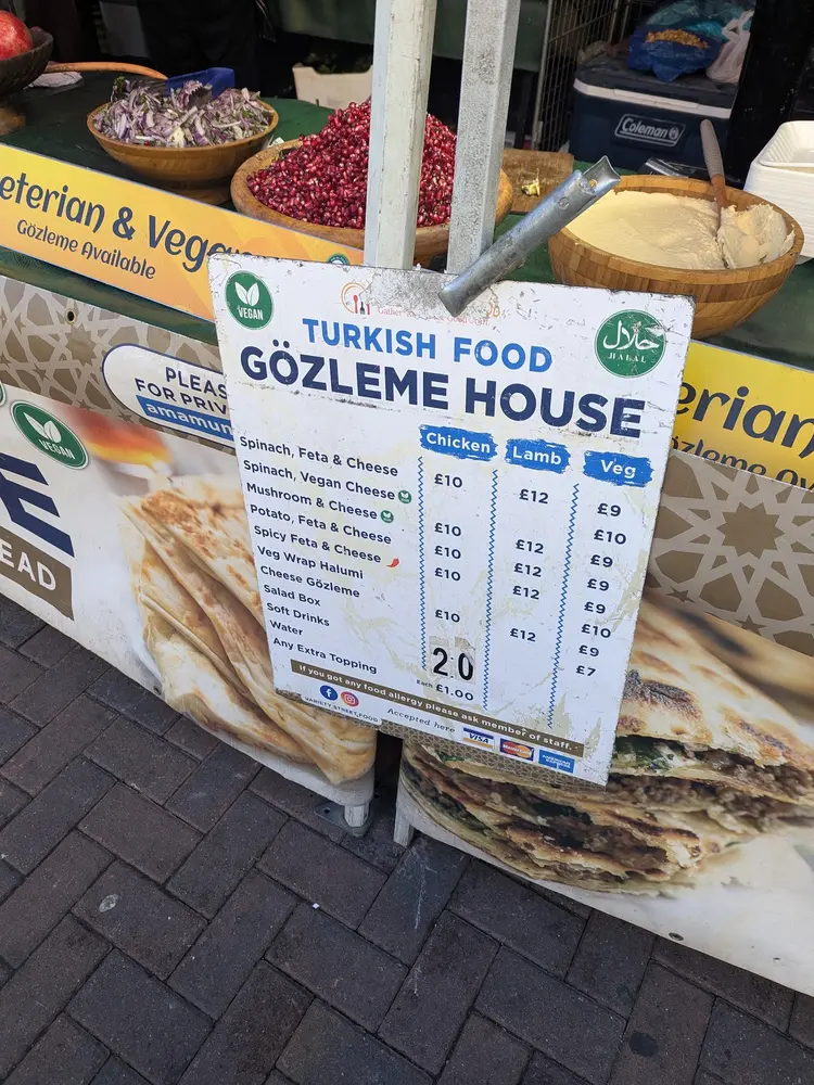 Turkish Food Gözleme House price board listing fillings with chicken, lamb and veg prices